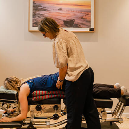 Dr Vanessa checking patients back
