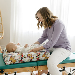 dr-and-baby-side-view