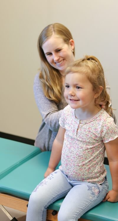 Dr Brittany and toddler smiling