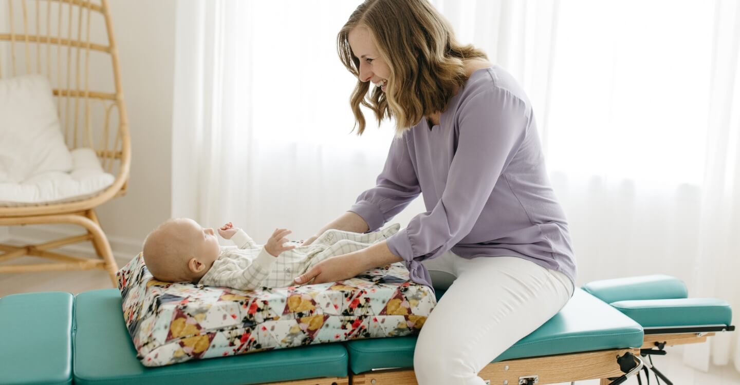 Chiropractor adjusting patient