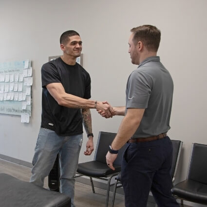 Dr Jared shaking patients hand