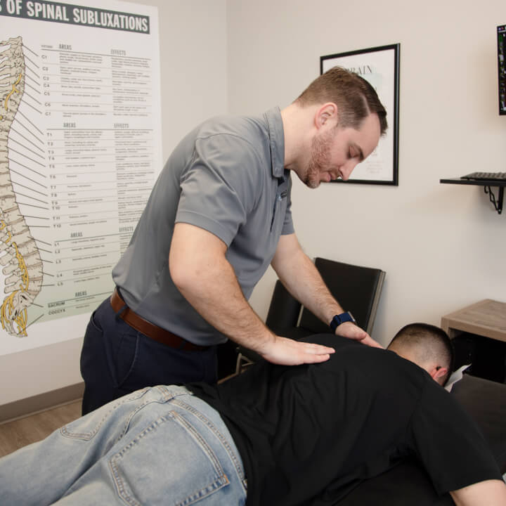 Dr. Jared adjusting patient