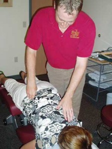 This is Dr. Rich adjusting a woman who is over 8 months pregnant.