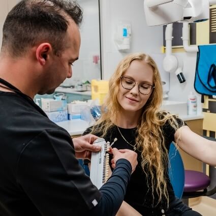 Dimitry talking with Dentist in Hervey Bay patient