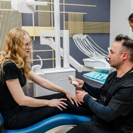 Dimitry showing Dentist in Hervey Bay patient oral care