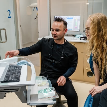 Dimitry talking with patient