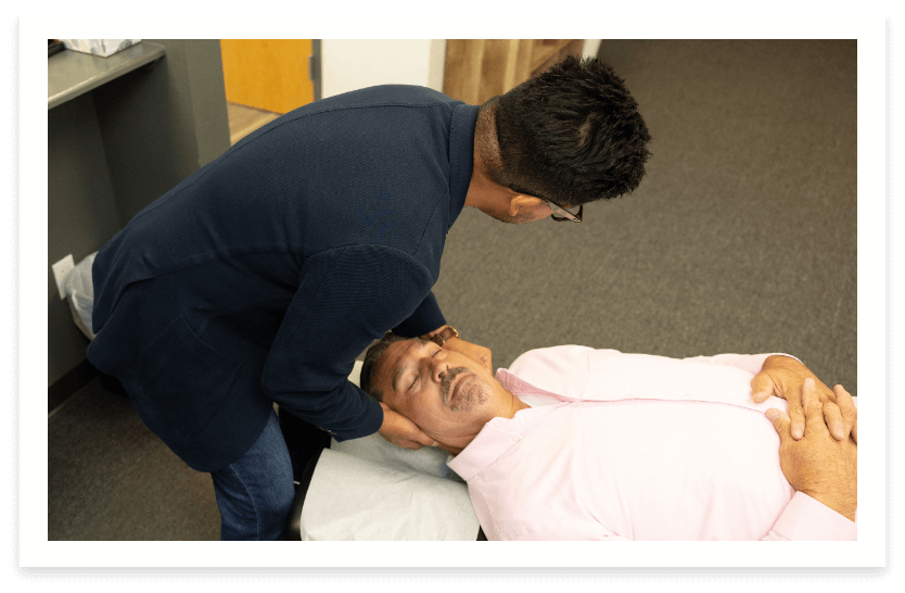 adjusting patients neck