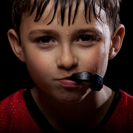 boy with sports mouthguard