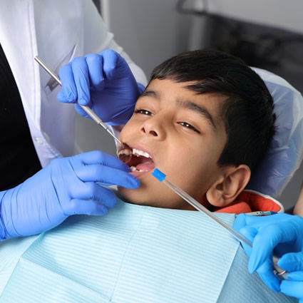 dentist working on child patient