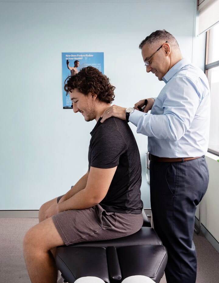 adjusting patient's neck