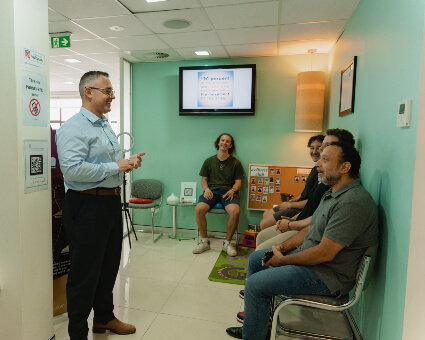 Talking to patients in reception