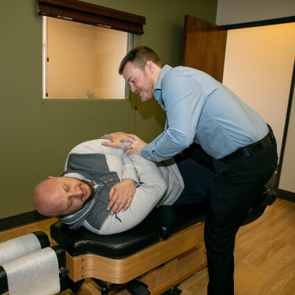 Dr. Logan doing side adjustment