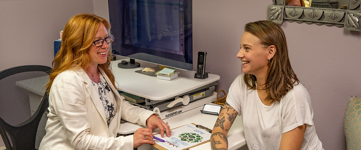 Doctor talking with patient