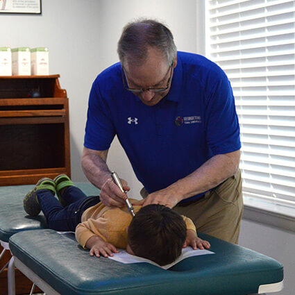 Child having neck adjusted