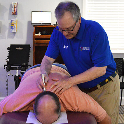 person getting neck adjustment