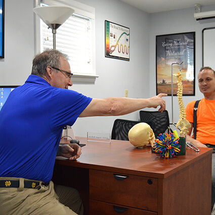 dr greg talking with patient