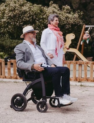 man using mobility aid outdoors