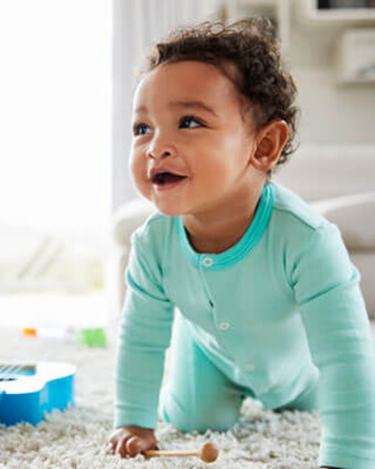 happy-baby-playing-at-home