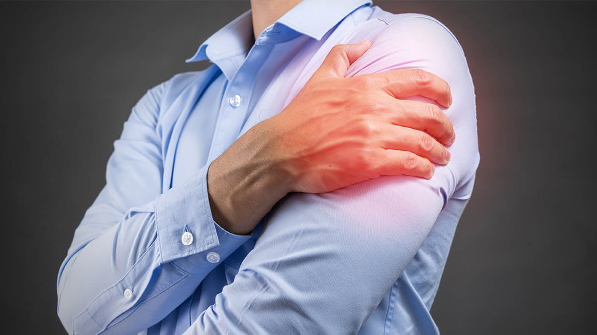 Man grabbing shoulder