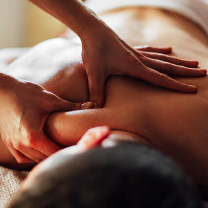 massage-therapist-working-on-mans-neck-sq