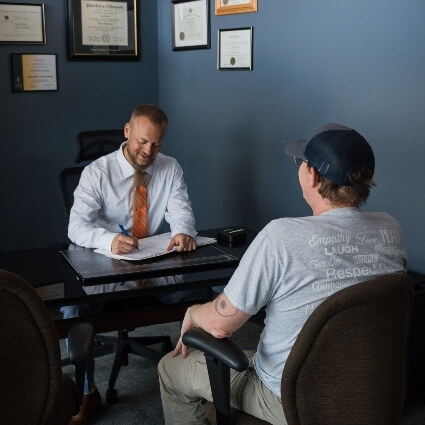 doctor talking with patient