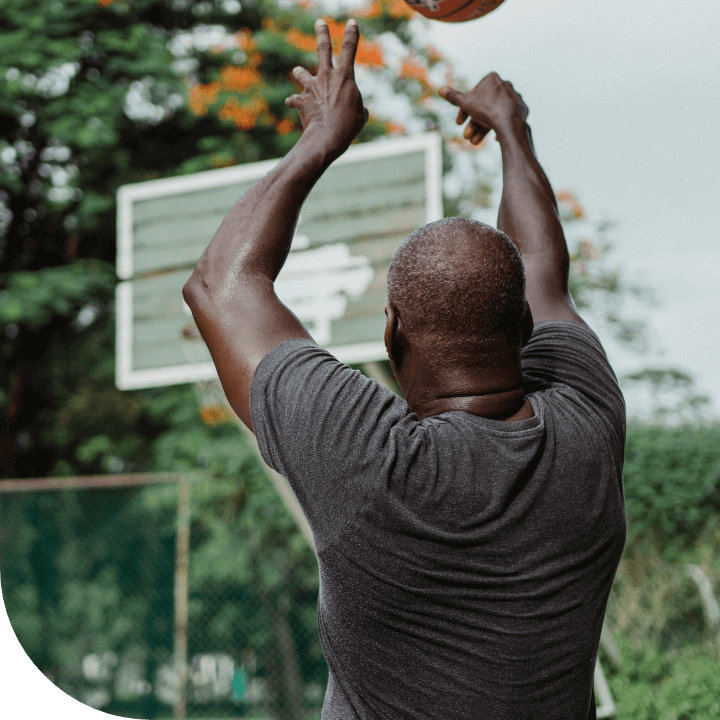 man playing basketball