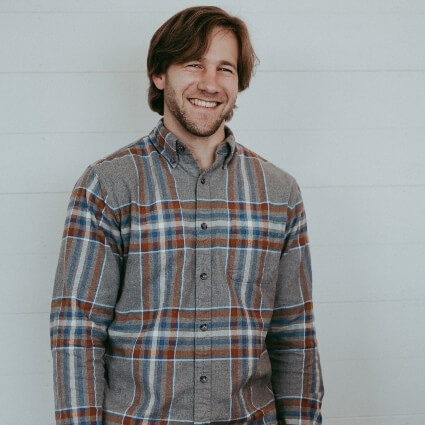 dr peter harris headshot flannel shirt