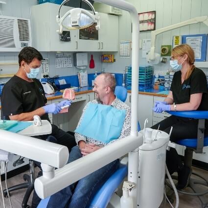 Smiling person in dental chair at Smith Street Dental