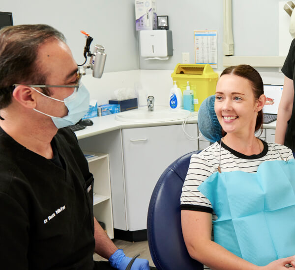 Patient consulting dentist