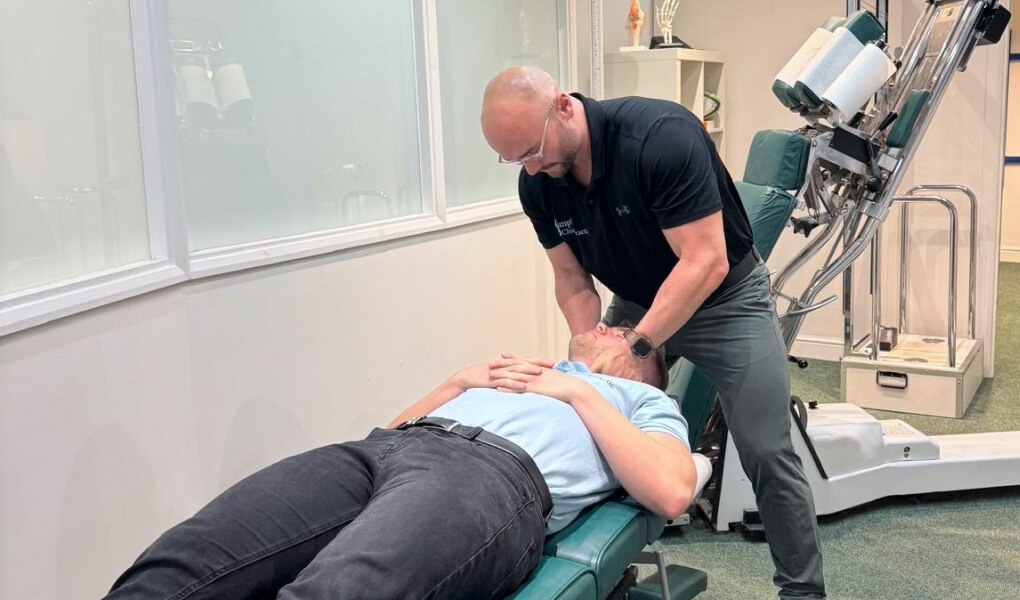 Dr. Daniel adjusting patient