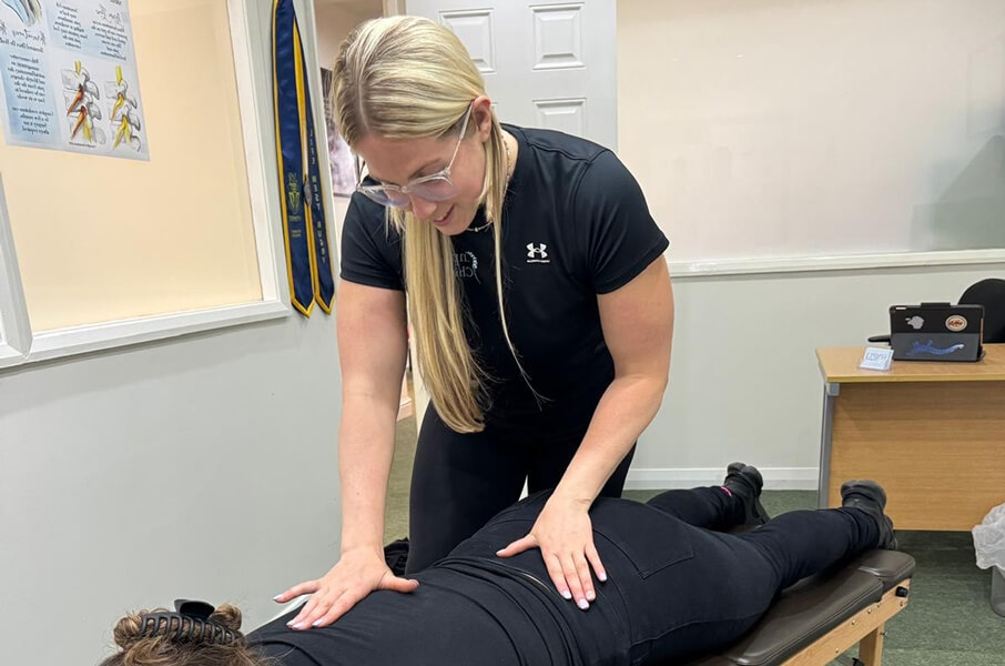 Chiropractor adjusting patient