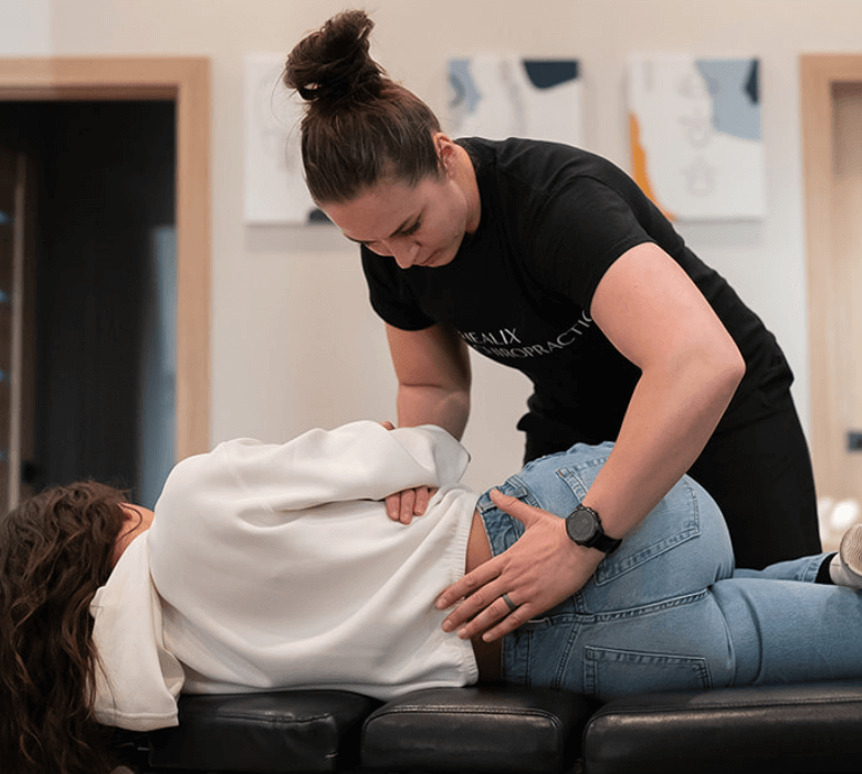 Female patient upper-back adjustment
