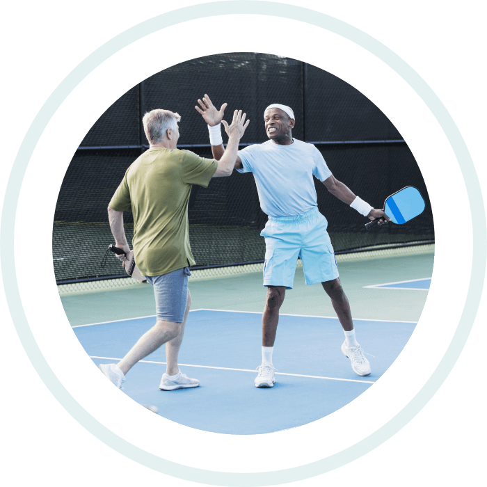 Two men playing tennis