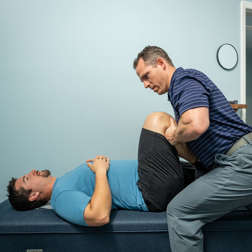 adjusting mans leg