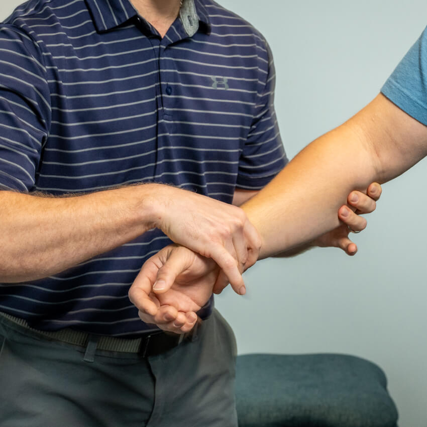 holding mans arm