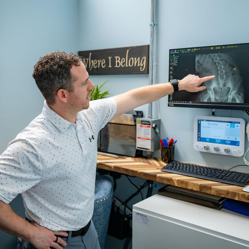 Dr Alec pointing to xray