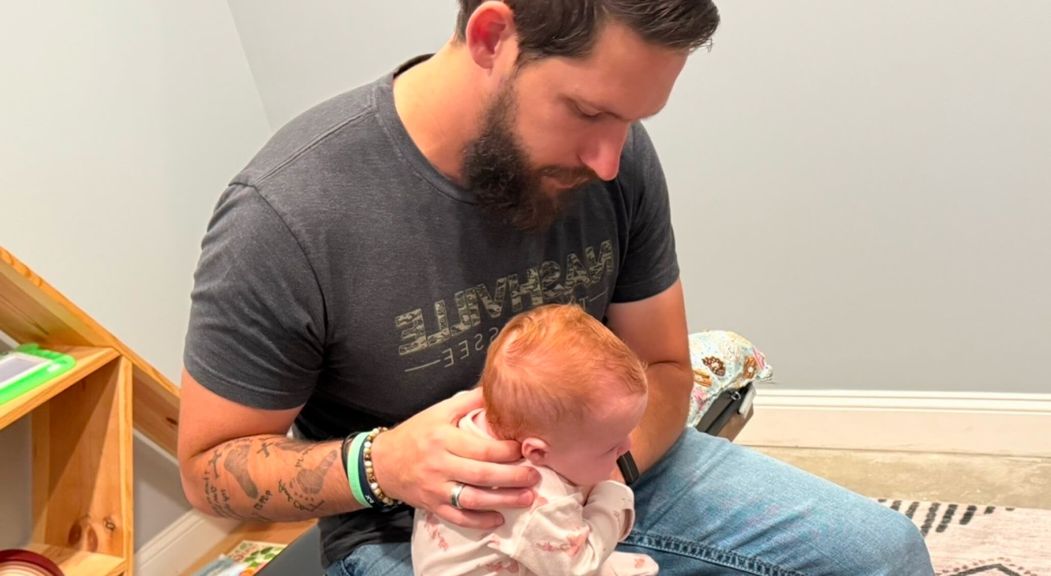 Chiropractor adjusting baby patient