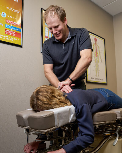 pressing on womans back