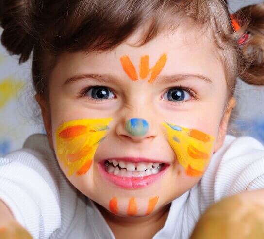 child with tiger face painting