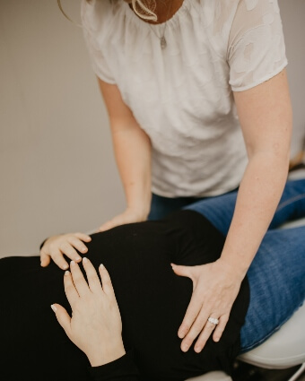 Chiropractic adjustment on pregnant lady