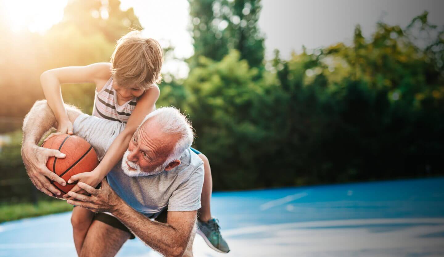 Grandfather playing with grand son