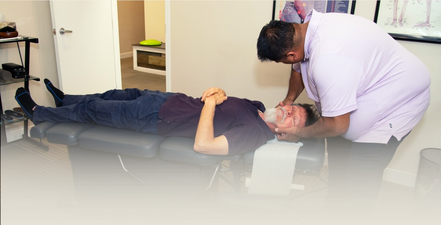 patient having back adjusted