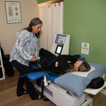 Dr. Buffie adjusting patient