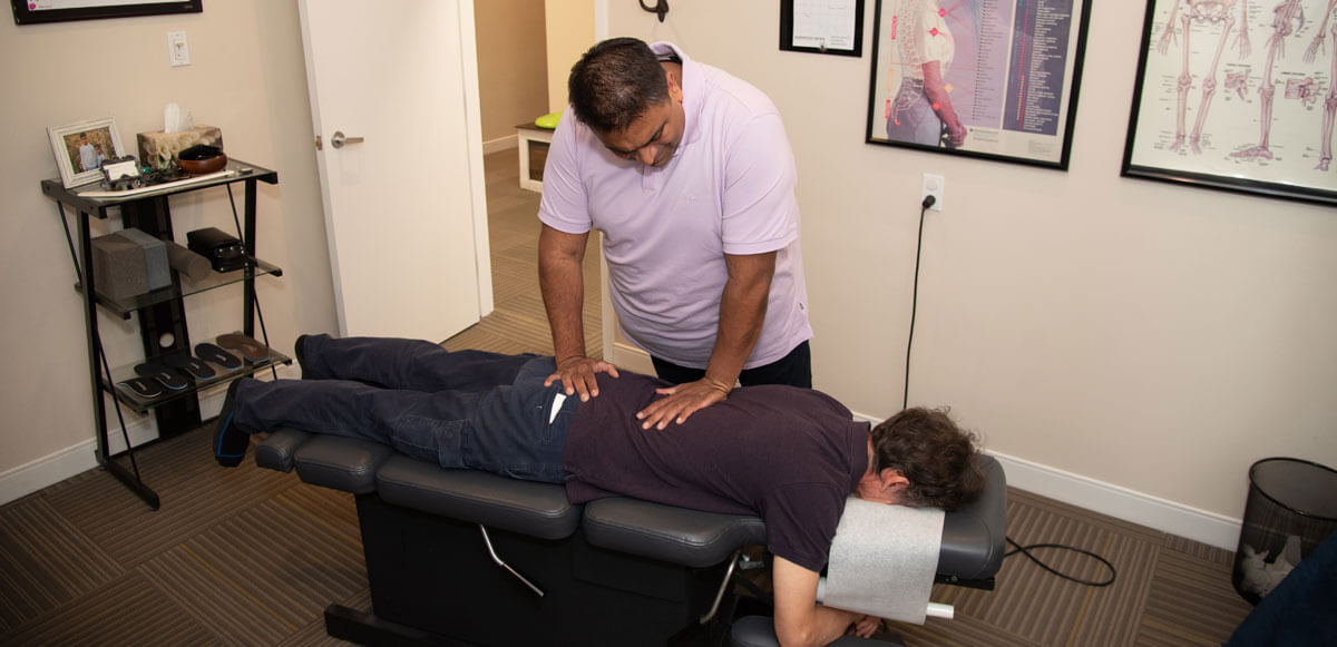 Dr Goyal adjusting patient