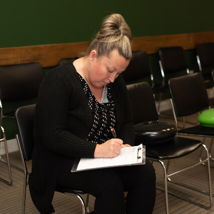 Woman filling out form