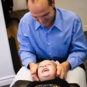 dr-jeff-adjusting-boys-neck-1