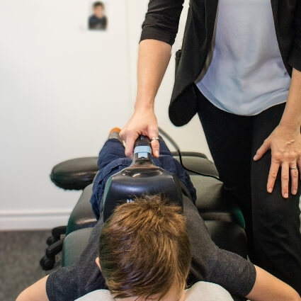 Advanced Chiropractic patient having back adjusted