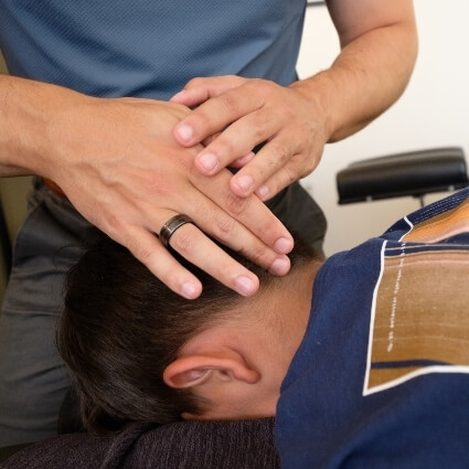 Dr NIck adjusting kids neck