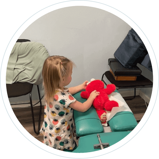 child playing on adjusting table