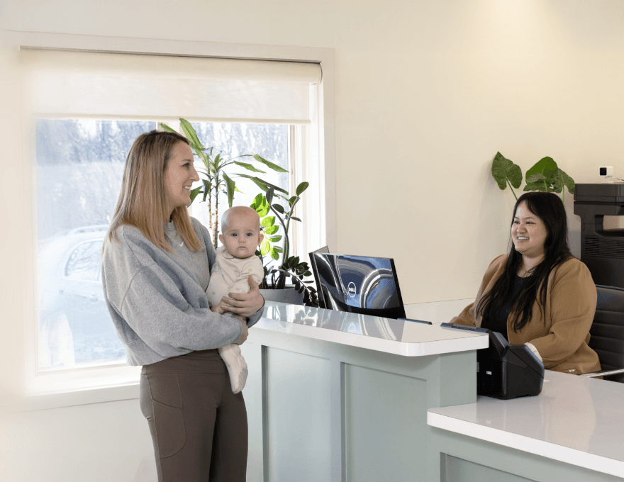 patient checking in at Clear Health and Wellness front desk